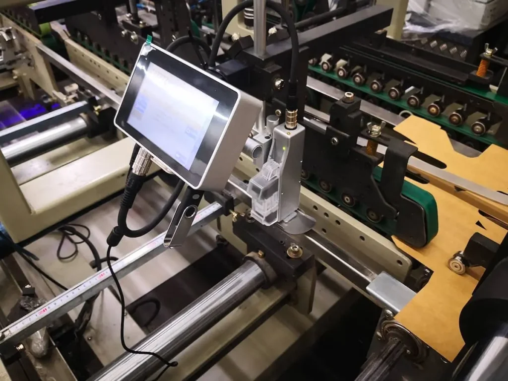 Automatische Gewinncode Codierung in einer Falt- und Klebemaschine ohne Anbindung eines PCs